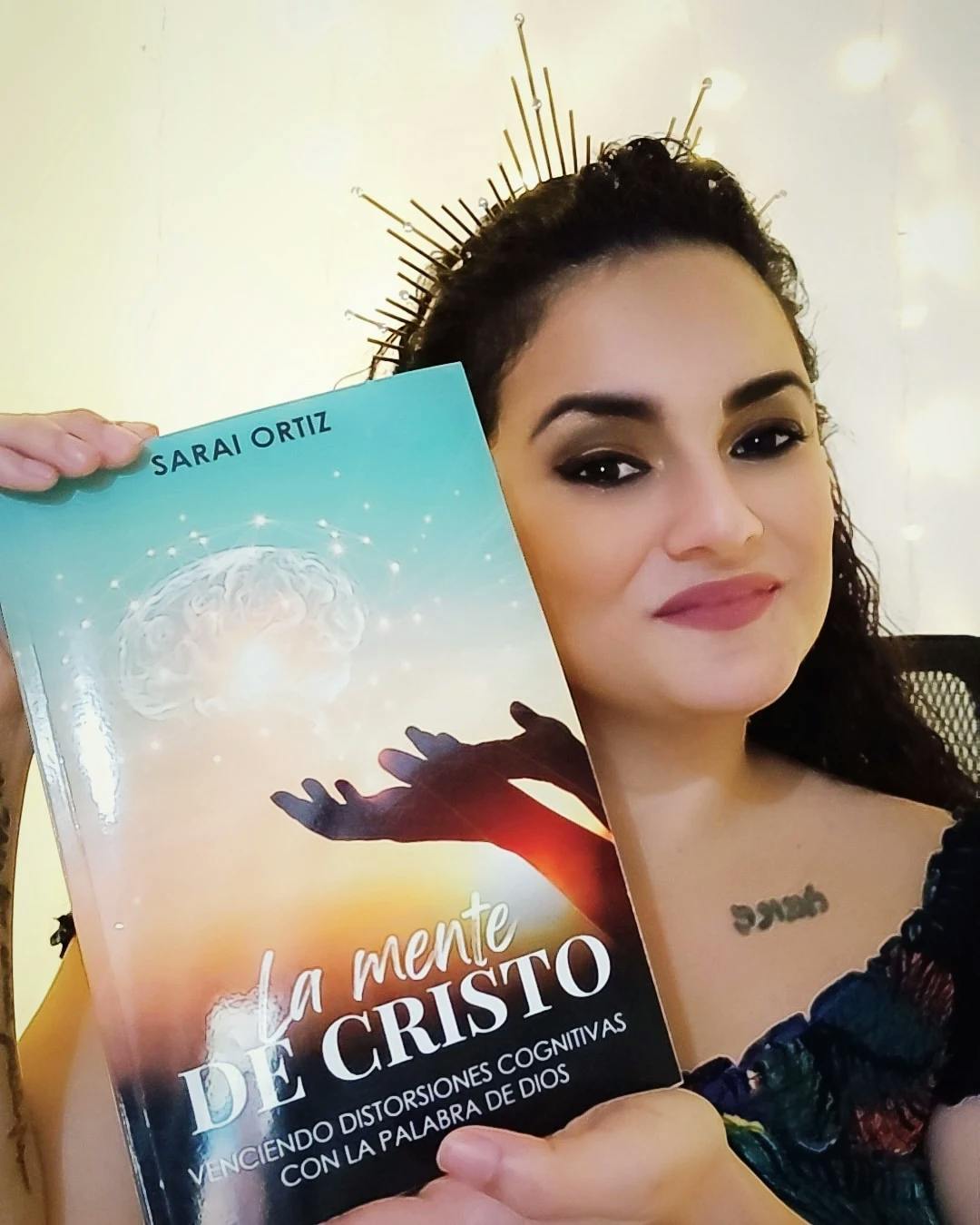 Sarai Ortiz showcasing her newly released book.